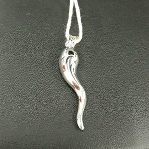 14k white gold Italian horn pendant